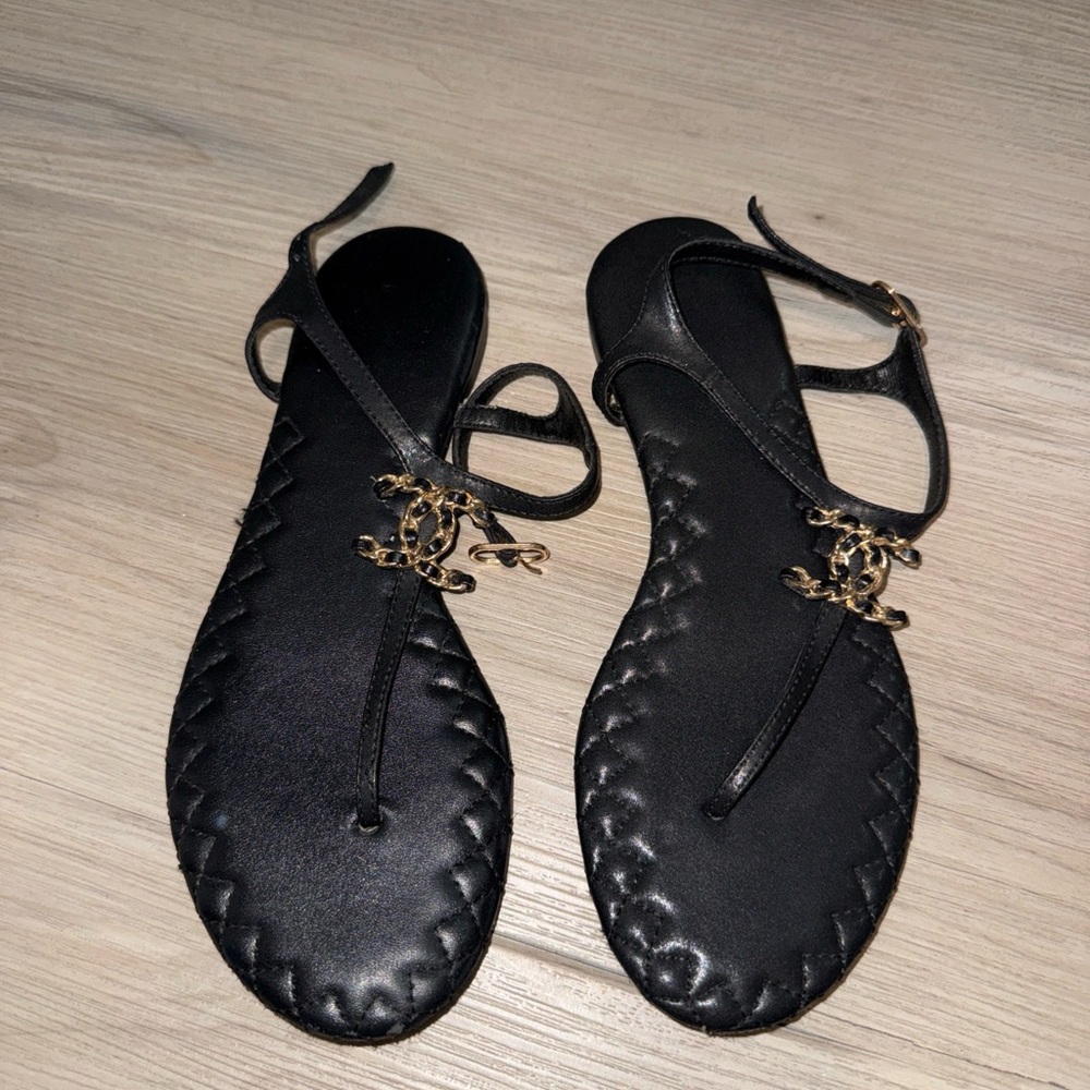 CHANEL Black Sandals with Gold Accents